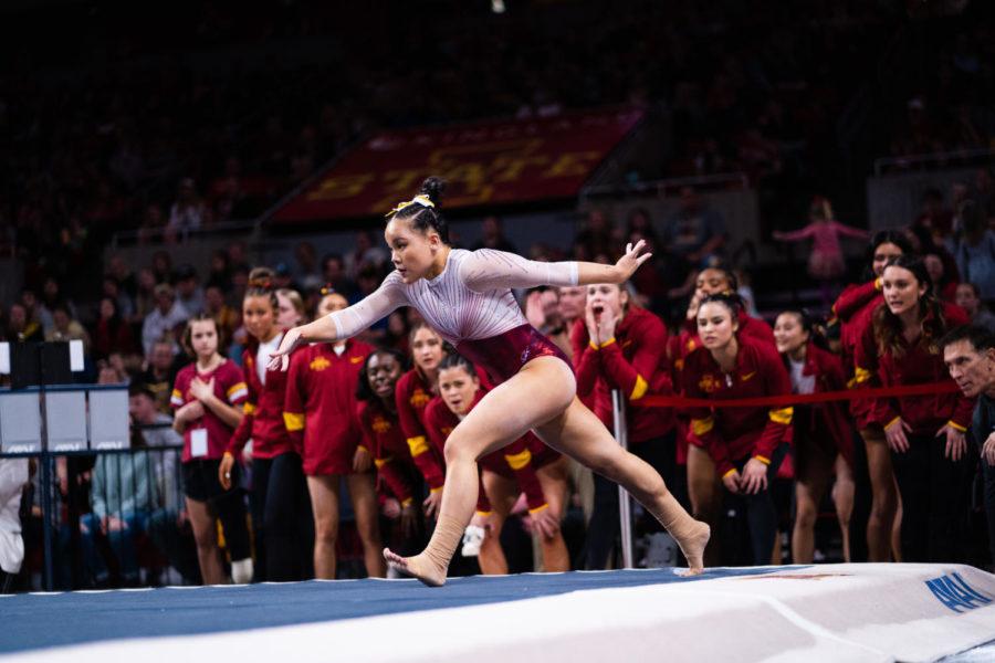 Hannah Loyim performs in the floor exercise in the Cyclones gymnastics meet against the University of Iowa on March 4, 2022.