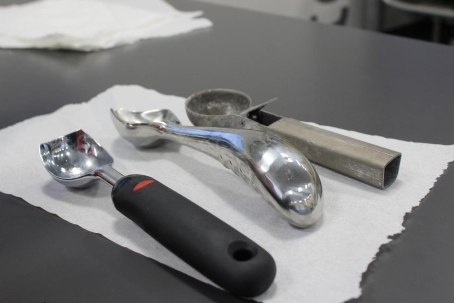 The Midnight Scoop is an ergonomic ice cream scooper (in the middle). It was designed and over-engineered by Mechanical and Aerospace Engineer, Michael Chou.