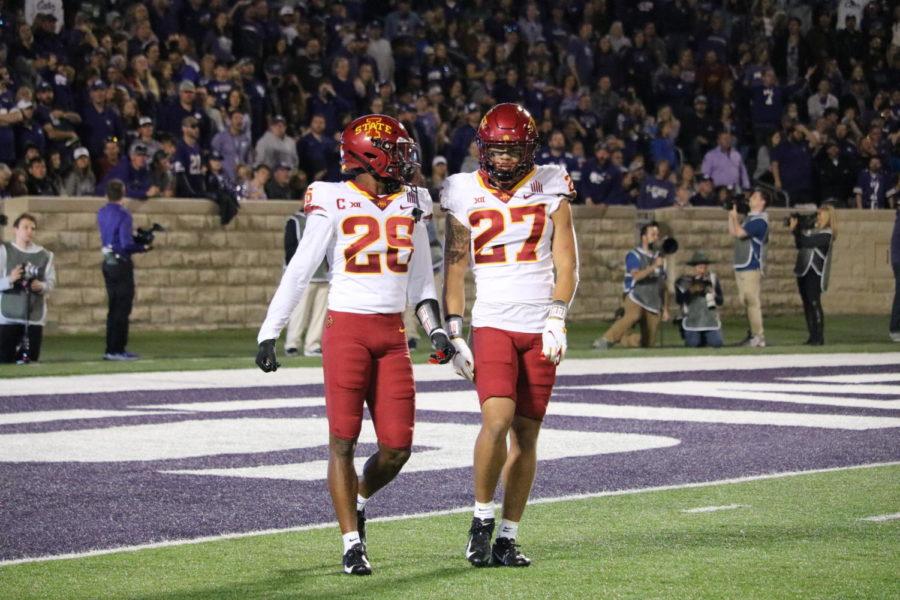 Iowa State defensive backs Anthony Johnson Jr (left) and Craig McDonald (right) walk toward the sideline in the Cyclones' 30-20 win over Kansas State on Oct. 16.