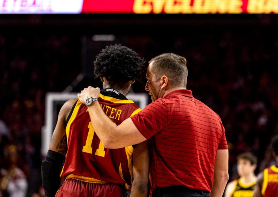 Tyrese Hunter talks with Iowa State head coach T.J. Otzelberger during the Cyclones 73–53 win over Iowa on Dec. 9, 2021.