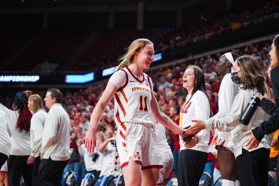 Emily Ryan smiles as she heads to the bench during Iowa States NCAA Tournament win over Georgia on March 20.