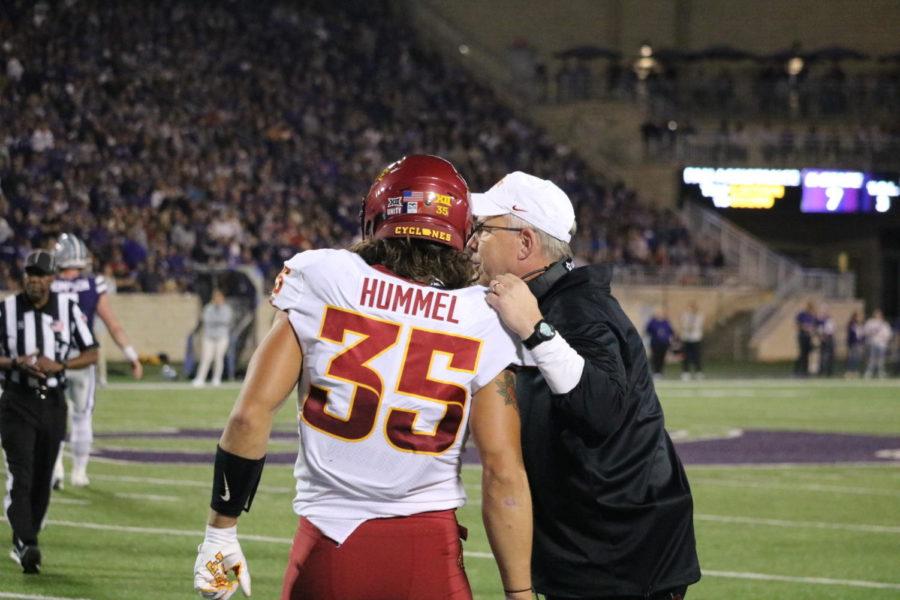 Jake Hummel talks with Iowa State defensive coordinator Jon Heacock against Kansas State on Oct. 16, 2021.