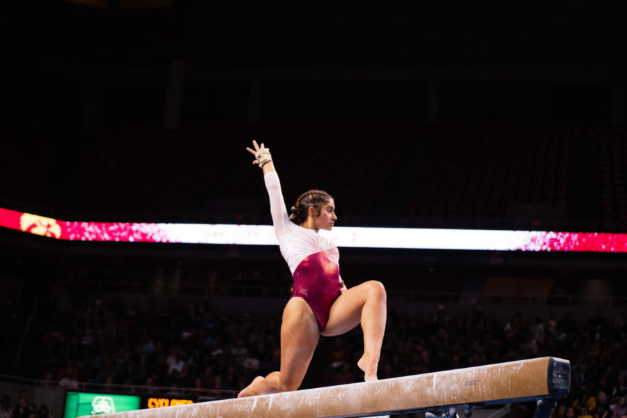 Iowa State junior Alondra Maldonado competes in the beam event during the Cyclones gymnastics meet against the University of Iowa on March 4.