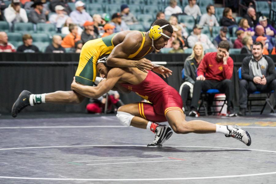 Iowa States Marcus Coleman takes down North Dakota States DJ Parker in the consolation semifinals at the 2022 Big 12 Wrestling Championships on March 6. Coleman won 18-2 technical fall. (Photo by Brett Rojo/Big 12 Conference)