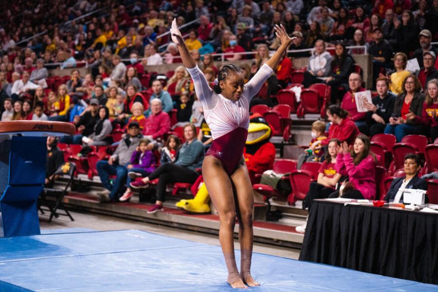 Redshirt junior Makayla Maxwell competes in the vault during the Cyclones gymnastics meet against the University of Iowa on March 4.