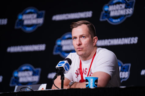 TJ Otzelberger attends a press conference at the United Center on March 24. 