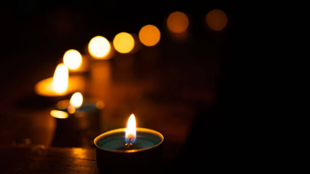 Students held a candlelight vigil Monday night for Yaakov Ben-David and Derek Nanni, two students who died in a crew club accident March 28, 2021 on Little Wall Lake. 