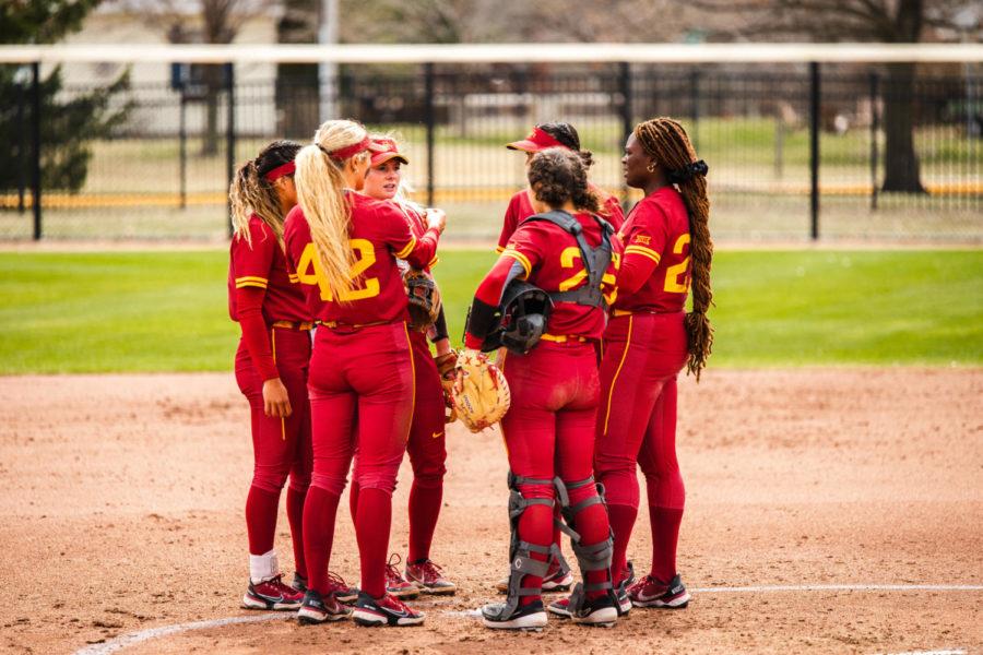 Iowa State softball infielders meet in the circle with starting pitcher Saya Swain during the Cyclones 11–1 loss April 10.