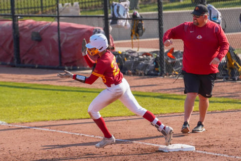 Iowa State freshman Angelina Allen rounds first base after hitting a home run against Iowa on April 26 2022 at the Cyclone Sports Complex.