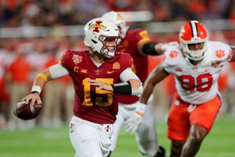 Iowa State quarterback Brock Purdy scrambles out of the pocket against No. 19 Clemson in the Cheez-It Bowl on Dec. 29, 2021. Purdy went 23-39, throwing for 204 yards, one touchdown and one interception in his final game as a Cyclone.