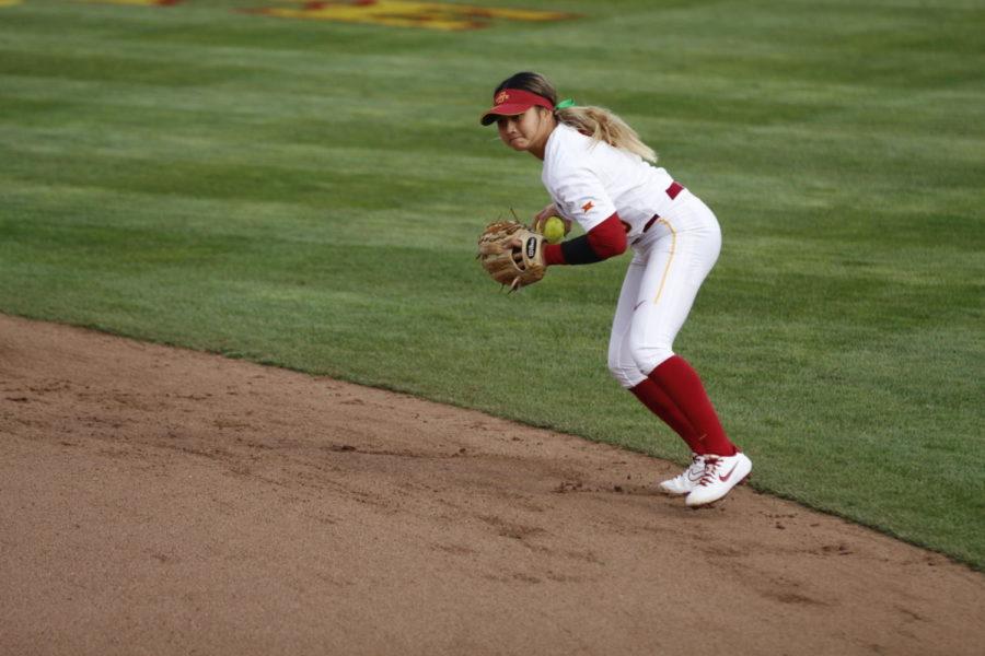 Iowa State infielder Alesia Ranches fields a ground ball in the Cyclones' 9–7 loss against No. 1 Oklahoma at the Cyclone Sports Complex on March 26, 2021.