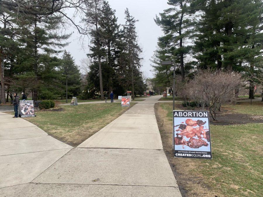 The anti-abortion group Created Equal posted graphic images of aborted fetuses around campus Wednesday.