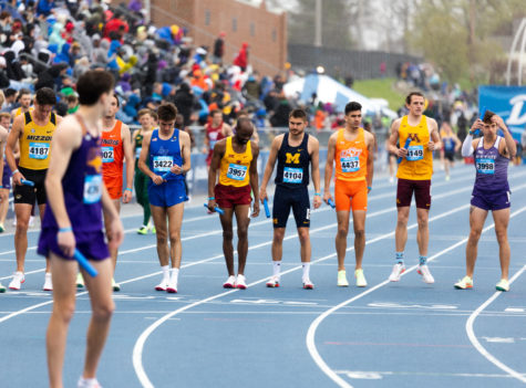 Senior distance runner Nehemia Too (center) stands on the start line before a relay race at the 2022 Drake Relays in Des Moines, Iowa. Too helped Iowa State to a first-place finish in the mens 4x1600m relay and eighth in the distance medley relay.