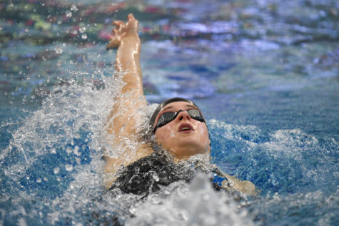 Fallon Dewitt competes at the 2022 Big 12 Swim and Dive Championships on Feb. 24, in Morgantown, West Virginia.