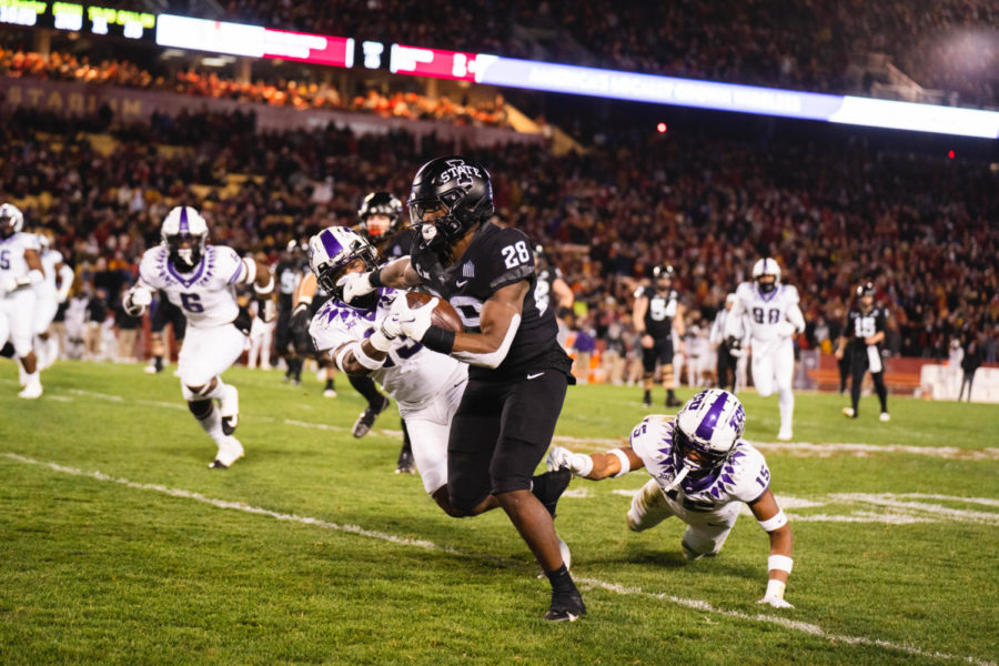 Iowa State running back Breece Hall runs past defenders for a touchdown in the Cyclones 48-14 win over TCU on Nov. 26, 2021.
