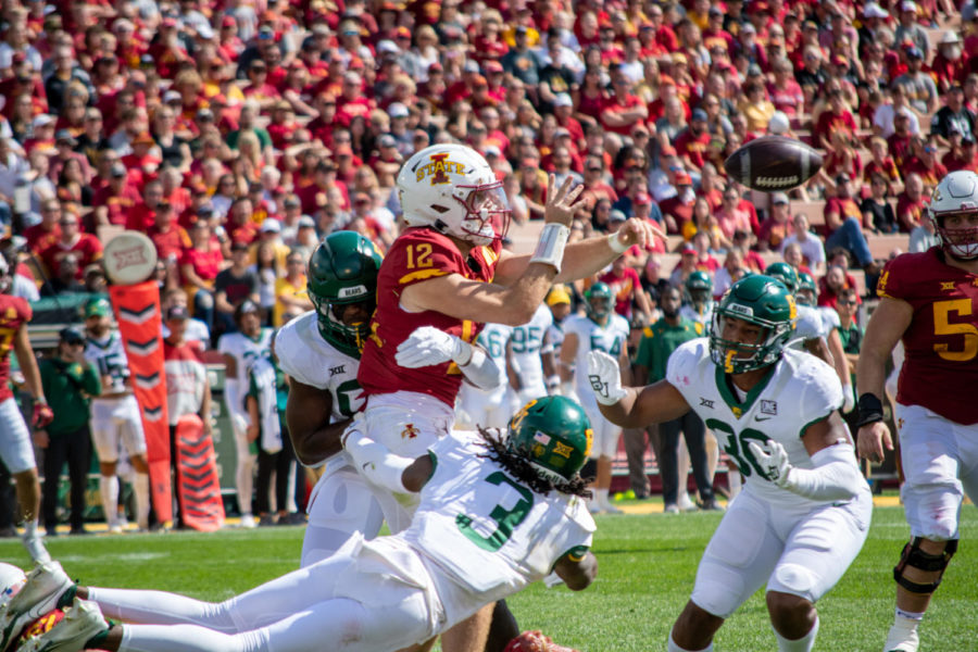 Quarterback Hunter Dekkers is tackled as he attempts to throw the ball away against Baylor on Sept. 24