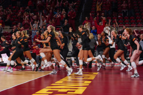 The Iowa State bench storms the court after an upset win over No. 13 Baylor Sept. 28. 