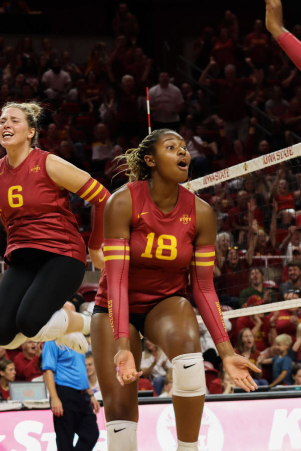 Kelsey+Perry+and+Eleanor+Holthaus+celebrate+a+point+against+the+Iowa+Hawkeyes+on+Sept.+9.
