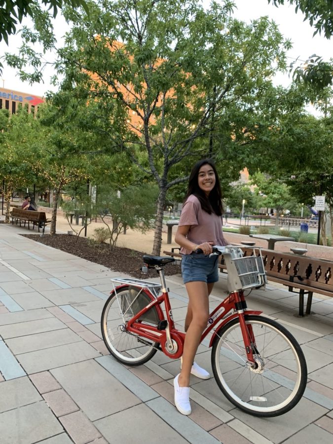 Vivian Flores poses for a picture mid-bike ride in her hometown, El Paso, Texas. Courtesy of Valarie Flores and Samantha Bell.