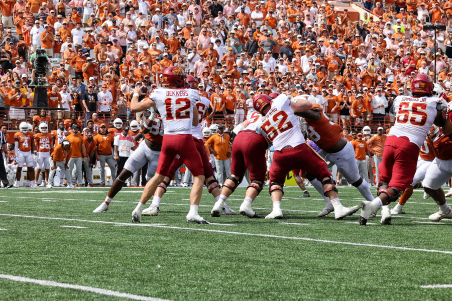 Cyclone quarterback Hunter Dekkers drops back to pass as the lineman battle against the Texas Longhorns on Oct. 26.