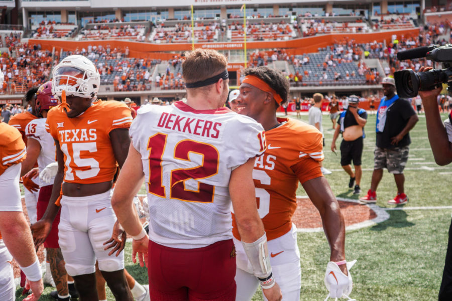 Cyclones and longhorns meet near midfield after game on Oct. 15.