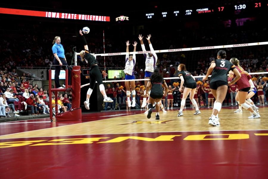 Eleanor Holthaus spikes the ball in 3-1 win over Kansas on Oct. 7.
