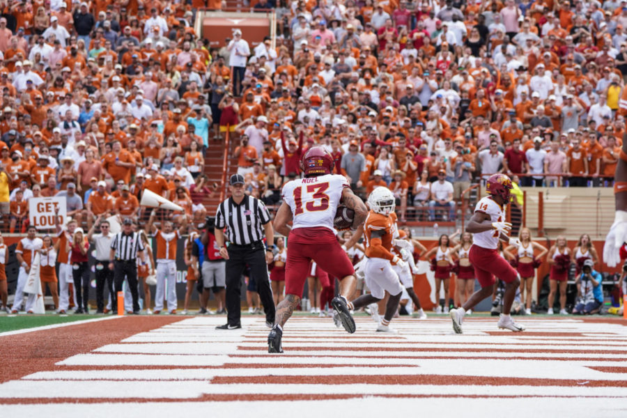 Jaylin Noel catches a touchdown against Texas on Oct. 15
