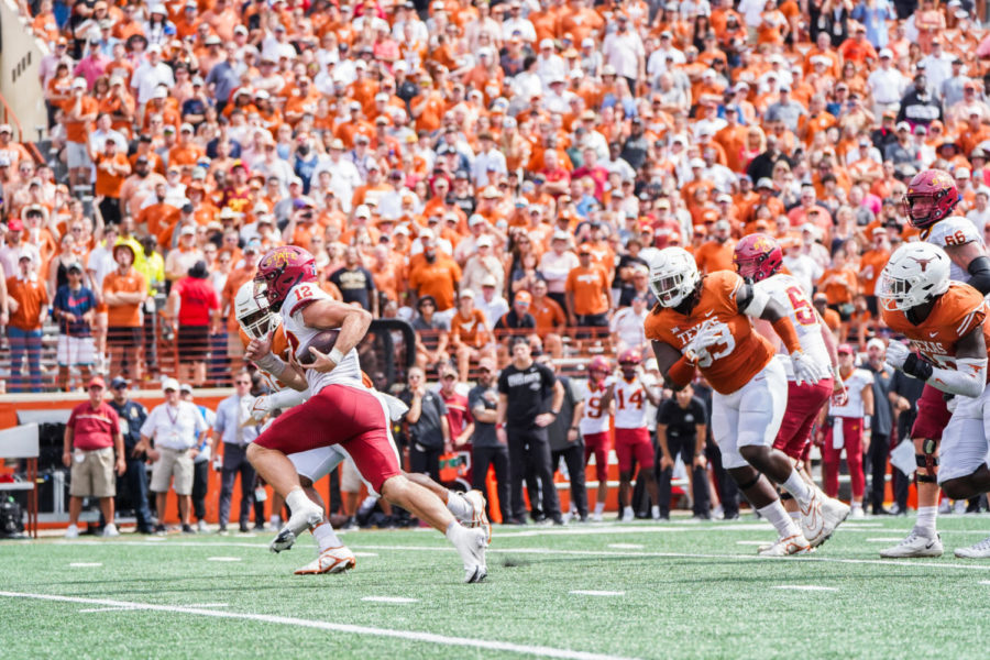 Hunter Dekkers runs with the football against Texas on Oct. 15