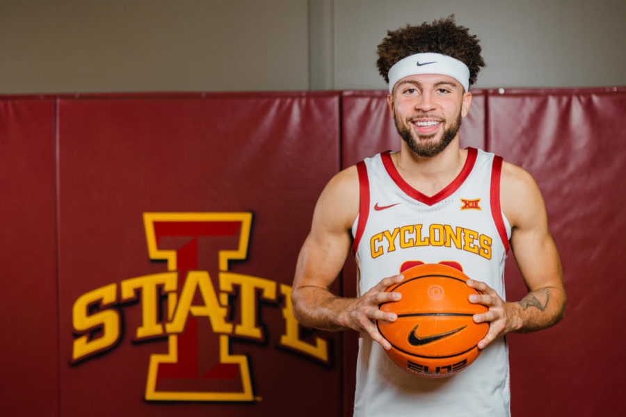 Gabe Kalscheur smiles in front of the Iowa State logo at Media Day on Oct. 12.