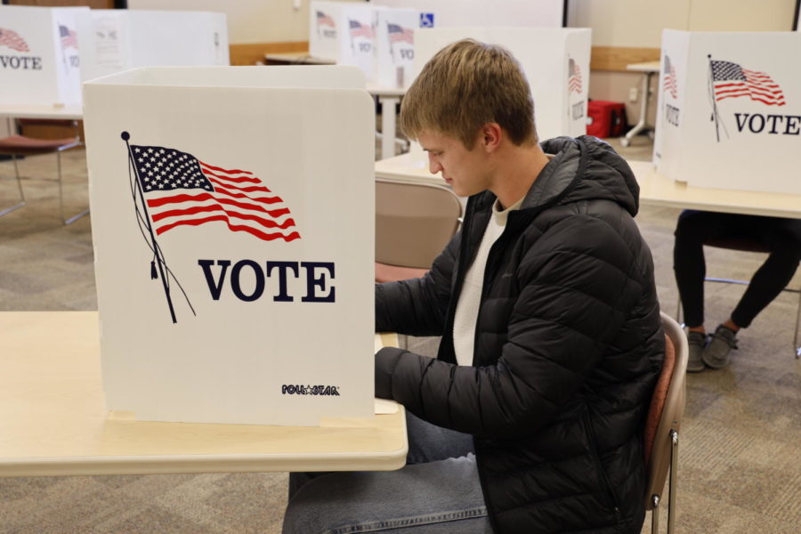 Junior Christopher Meyer votes at Union Drive Community Center on Tuesday, Nov. 8, 2022.