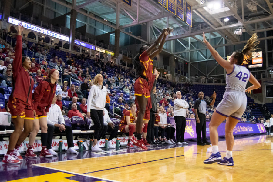 Nyamer Diew jumps for a three in front of the Iowa State bench in the game against UNI at the McLeod Center on Nov. 16, 2022.