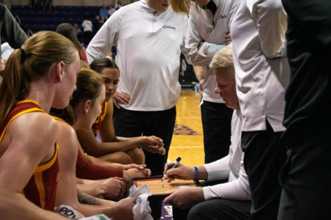 Head coach Bill Fennelly draws out a play during a timeout in the game against UNI at the McLeod Center on Nov. 16, 2022.