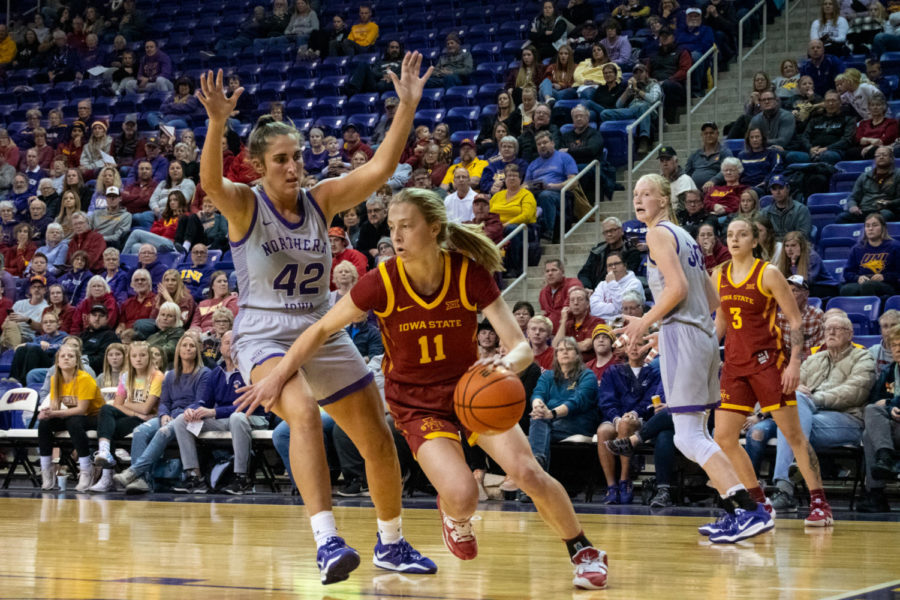 Emily Ryan runs past a defender in the game against UNI at the McLeod Center on Nov. 16, 2022.
