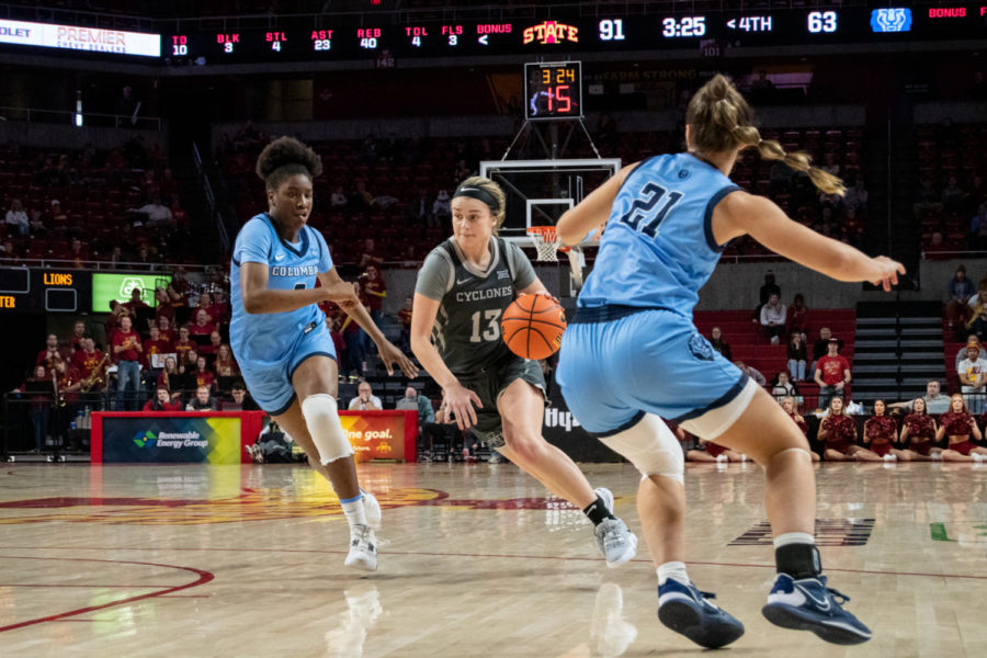 Maggie Espenmiller-McGraw runs past a defender and drives towards the basket in the game against Columbia University on Nov. 20, 2022.