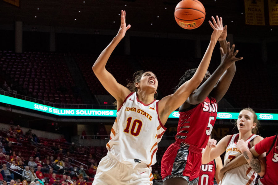 Stephanie Soares stretches out to rebound the ball in the game against SIUE in Hilton Coliseum on Tuesday Nov. 29, 2022.