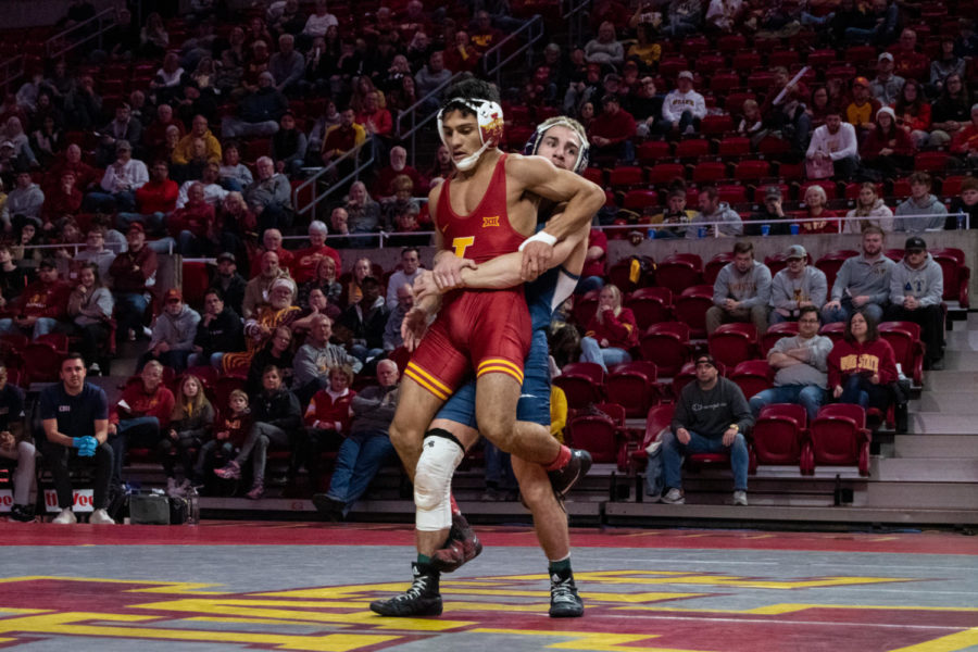 California Baptists Elijah Griffin holds Iowa States Kysen Terukina up in the air during the match on Saturday Nov. 12, 2022.