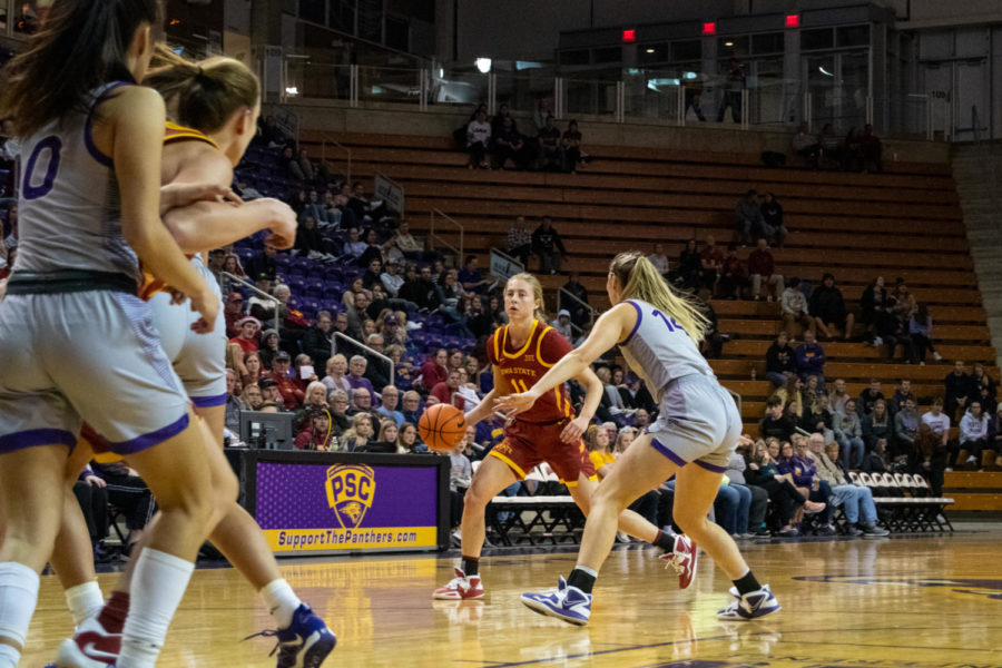 Emily Ryan looks to make a play at the top of the arch in the game against UNI at the McLeod Center on Nov. 16, 2022.