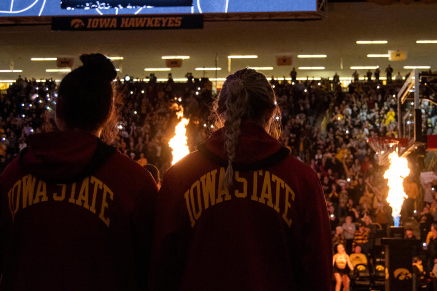 As the Iowa Womens Basketball team gets announced, the Iowa State Womens team waits for the game to start at Carver-Hawkeye Arena on Dec. 7, 2022.