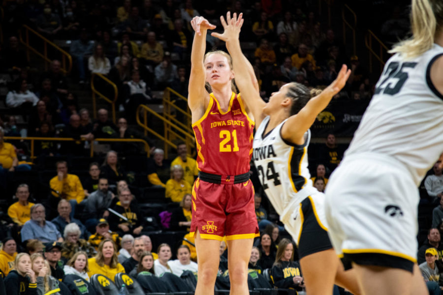 Lexi Donarski jumps up to shoot a three in the game against Iowa at Carver-Hawkeye Arena on Dec. 7, 2022.