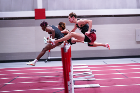 Alec Carr competes in the 60m hurdles at Lied Recreational Center in the ISU Holiday Invitational on Dec. 10, 2022.