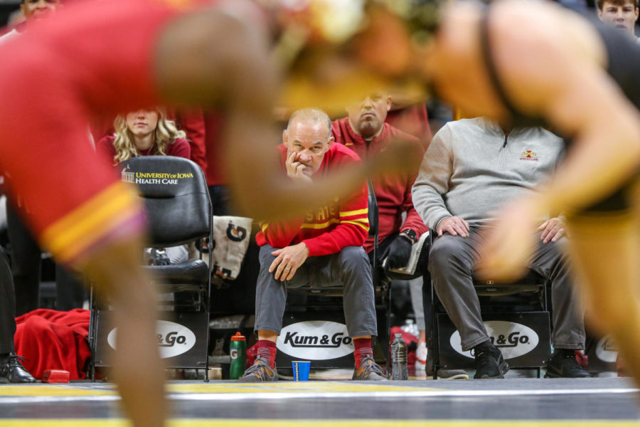 Iowa State Head Coach Kevin Dresser watches from the Cyclones corner during the CyHawk wrestling dual on Dec. 4, 2022.