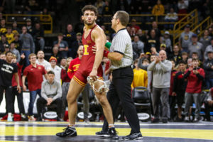 Iowa State's Yonger Bastida taunts Iowa's Jacob Warner during the CyHawk wrestling dual on Dec. 4, 2022.