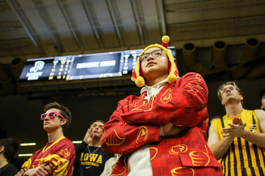 An Iowa State fan watches the final minutes during the 2022 CyHawk mens basketball game. Dec. 8, 2022. 