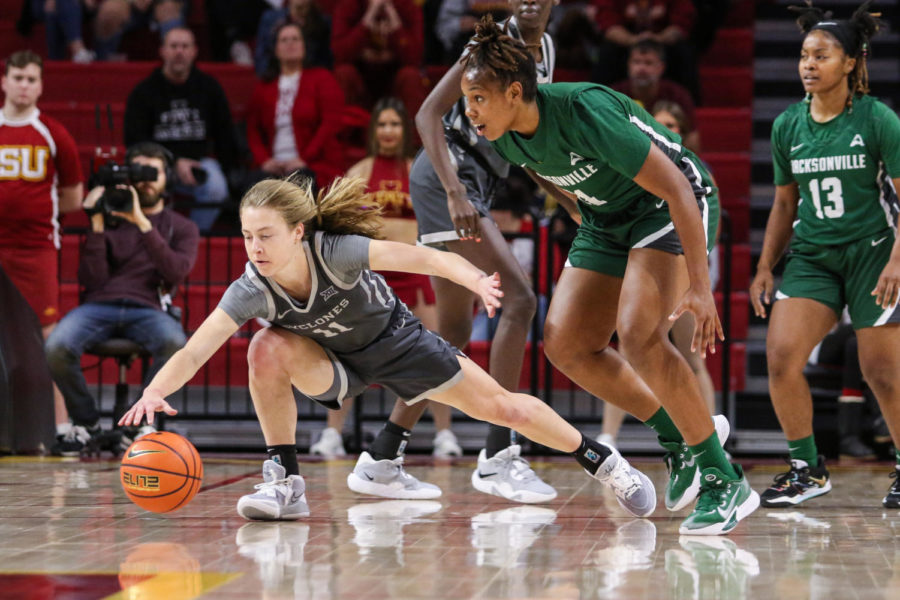 Emily Ryan reaches for a loose ball against Jacksonville on Dec. 11, 2022.