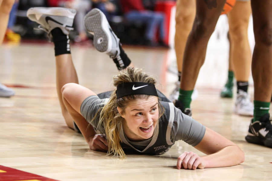 Maggie Espenmiller-McGraw gets fouled on her way to the hoop against Jacksonville on Dec. 11, 2022.