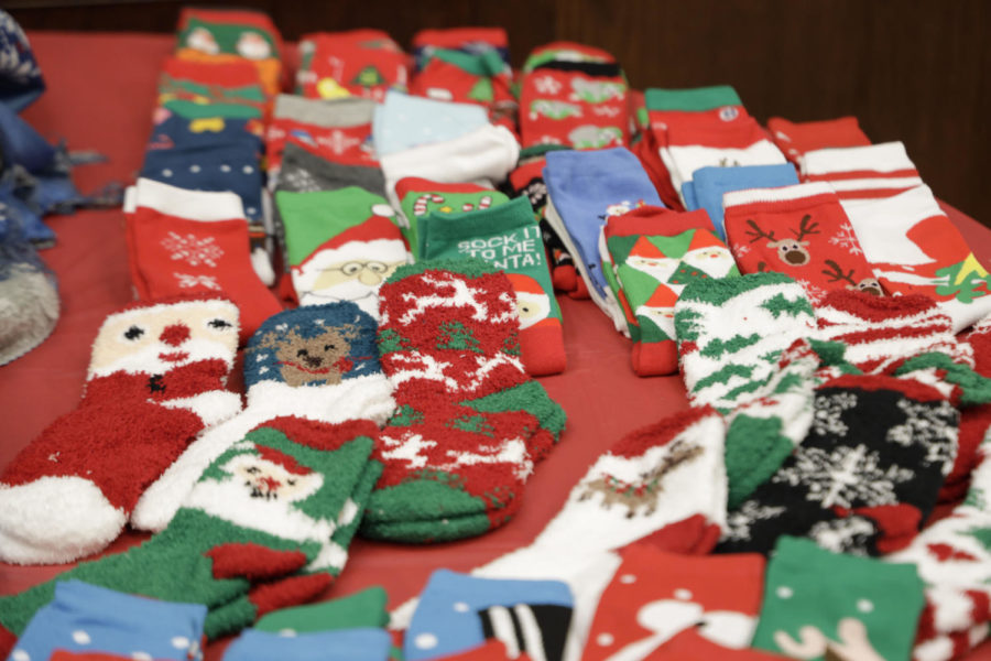 Holiday themed socks for participants in the Gingerbread House Decorating Contest at the Memorial Union on Dec. 6.
