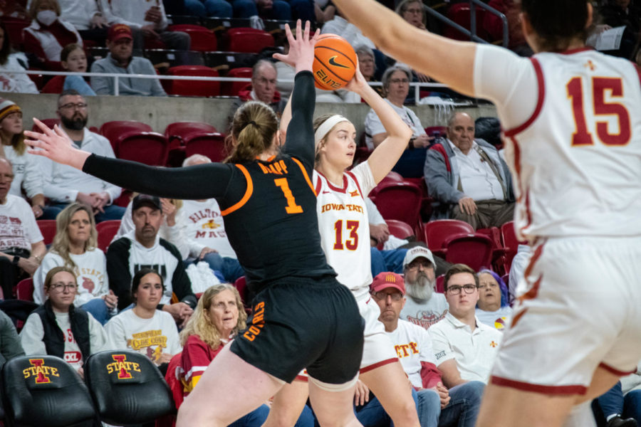 Maggie Espenmiller-McGraw looks to pass the ball during the game against Oklahoma State in Hilton Coliseum on Jan. 18, 2023.