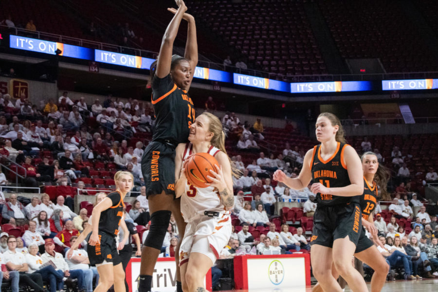 Denae Fritz runs into a defender during the game against Oklahoma State in Hilton Coliseum on Jan. 18, 2023.