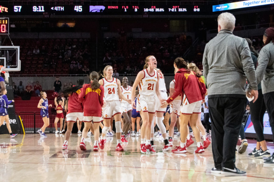 The Iowa State bench comes off of the bench during a timeout to celebrate with the other five players during the game against Kansas State in Hilton Coliseum on Jan. 11, 2023.
