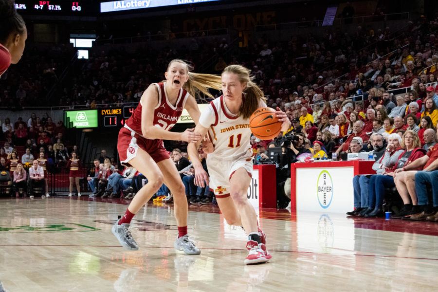 Emily+Ryan+pushes+past+former+teammate+Aubrey+Joens+during+the+game+against+Oklahoma+in+Hilton+Coliseum+on+Jan.+28%2C+2023.